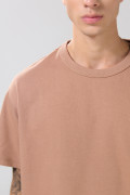 Camiseta oversize unicolor manga corta con hombro caído