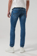 Jean tiro bajo skinny azul oscuro con ligeros desgastes