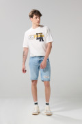 Bermuda de jean azul slim tiro bajo con rotos en frente