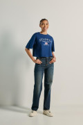 Camiseta crop top oversize azul con texto college de Atlanta