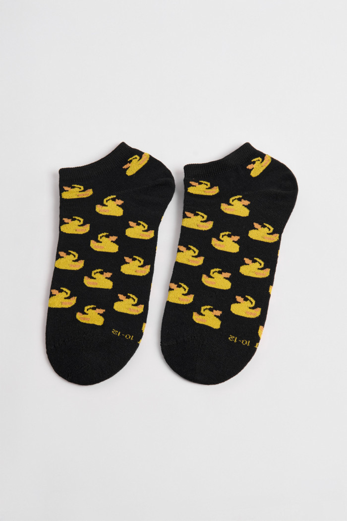 Medias tobilleras unicolores con patos amarillos