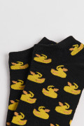 Medias tobilleras unicolores con patos amarillos