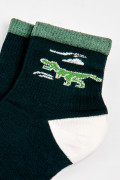 Medias cortas verdes oscuras de dinosaurio con contrastes