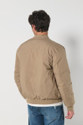 Chaqueta bomber unicolor acolchada doble faz con bolsillos