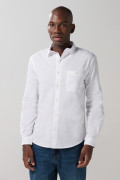 Camisa unicolor manga larga con texturas y bolsillo