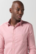 Camisa unicolor manga larga con texturas y bolsillo
