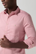 Camisa unicolor manga larga con texturas y bolsillo