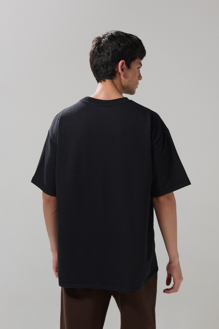 Camiseta en algodón pesado unicolor manga corta oversize