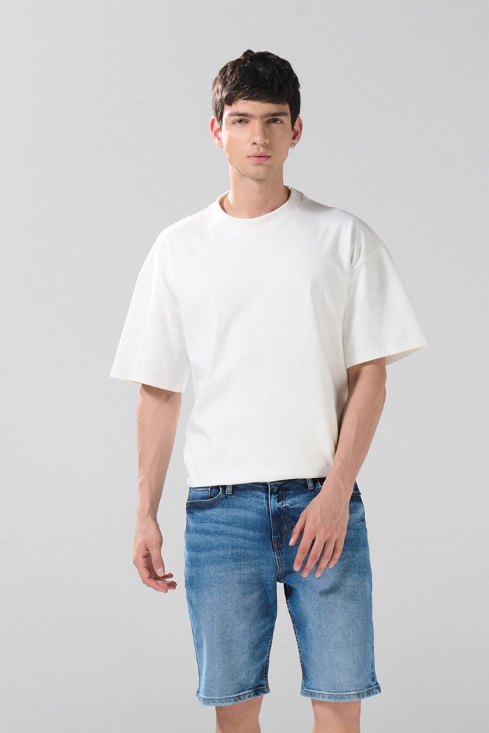 Bermuda slim tiro bajo de jean azul medio con bolsillos