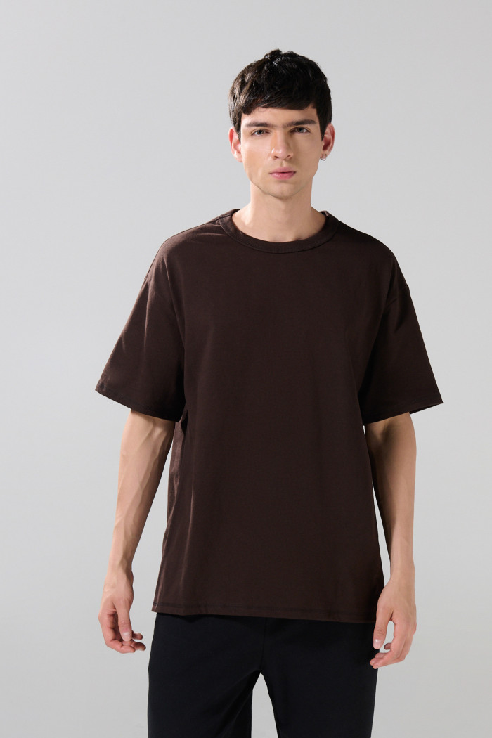 Camiseta oversize unicolor manga corta con hombro caído