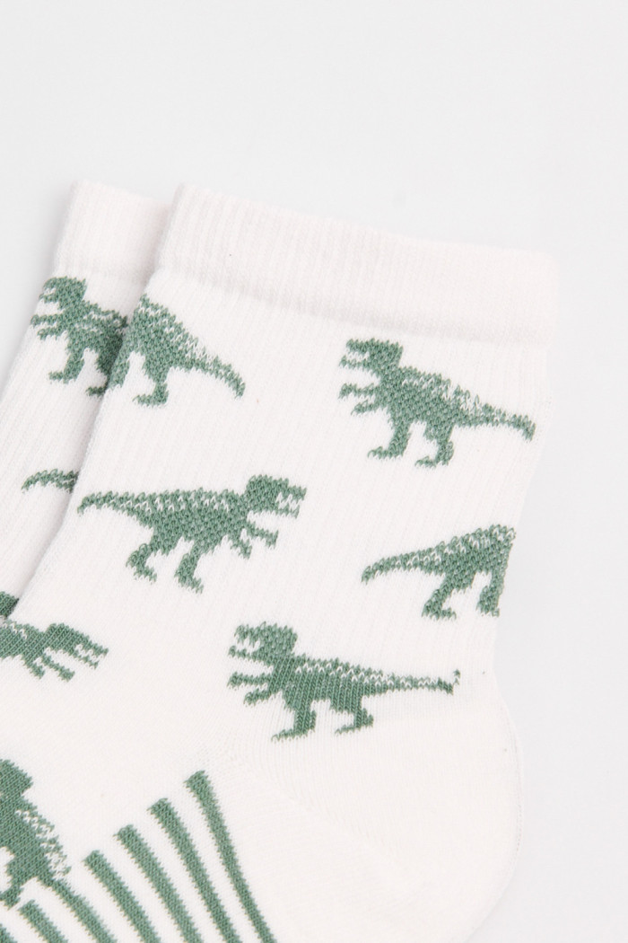 Medias cortas unicolores con rayas y arte de dinosaurios