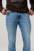 Jean azul medio skinny ceñido con tiro bajo y bolsillos