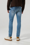Jean azul medio skinny ceñido con tiro bajo y bolsillos