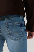 Jean azul medio skinny ceñido con tiro bajo y bolsillos