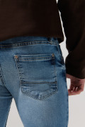 Jean azul medio skinny ceñido con tiro bajo y bolsillos