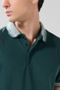 Camiseta polo unicolor manga corta con botones en frente