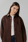 Blusa unicolor oversize manga larga en tela suede
