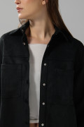 Blusa unicolor oversize manga larga en tela suede
