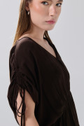 Blusa unicolor con elástico en cintura y manga larga