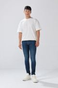 Jean tiro bajo skinny azul oscuro con costuras visibles
