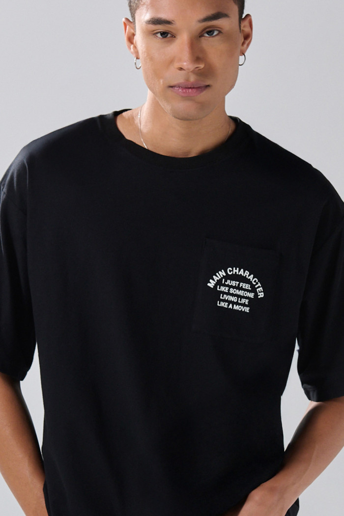 Camiseta cuello redondo unicolor oversize en tela pesada