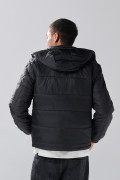 Chaqueta unicolor acolchada con capota y rombos
