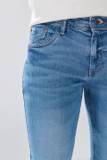 Jean azul medio skinny ceñido con desgastes y tiro bajo
