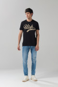 Jean azul claro tiro bajo skinny con ligeros desgastes