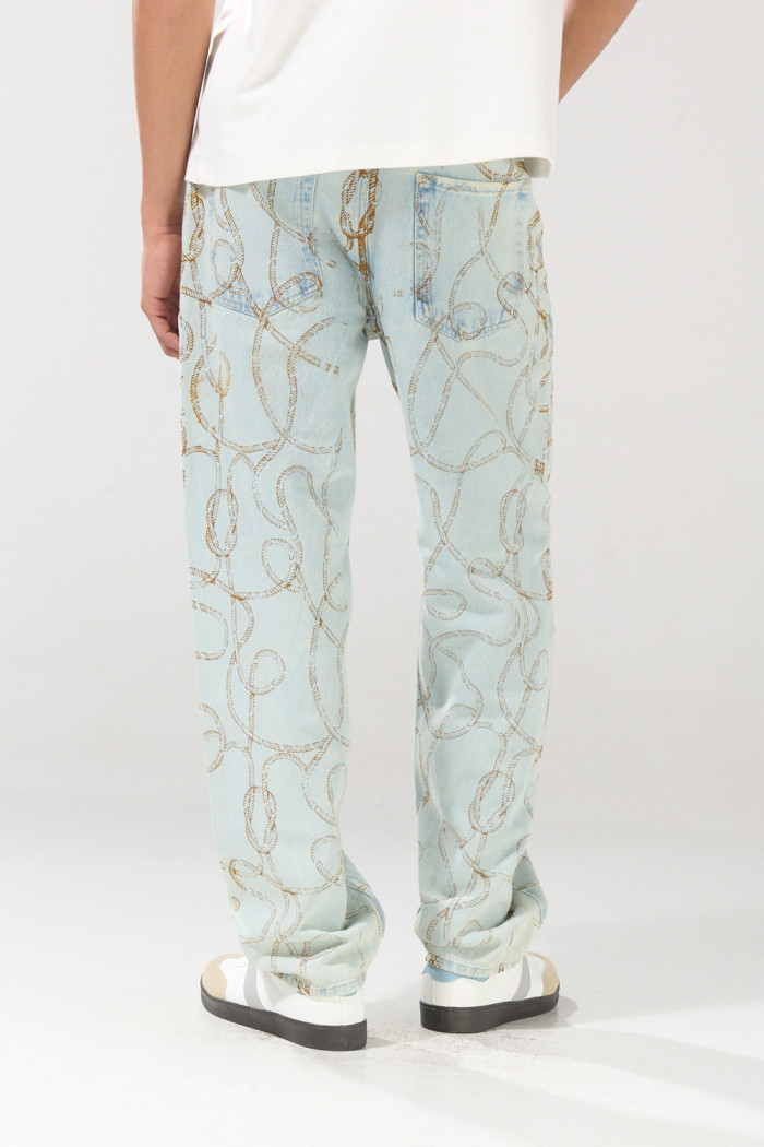 Jean loose azul claro con tiro medio y diseños