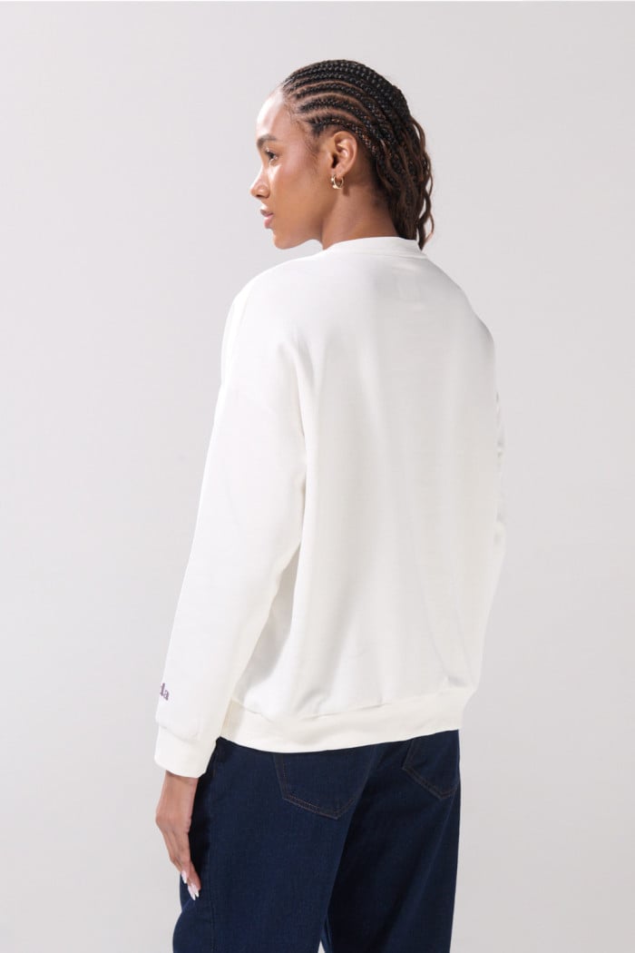 Buzo oversize cuello redondo crema con arte de Mafalda