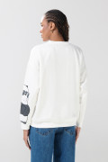 Buzo oversize crema de Osos Escandalosos cuello redondo
