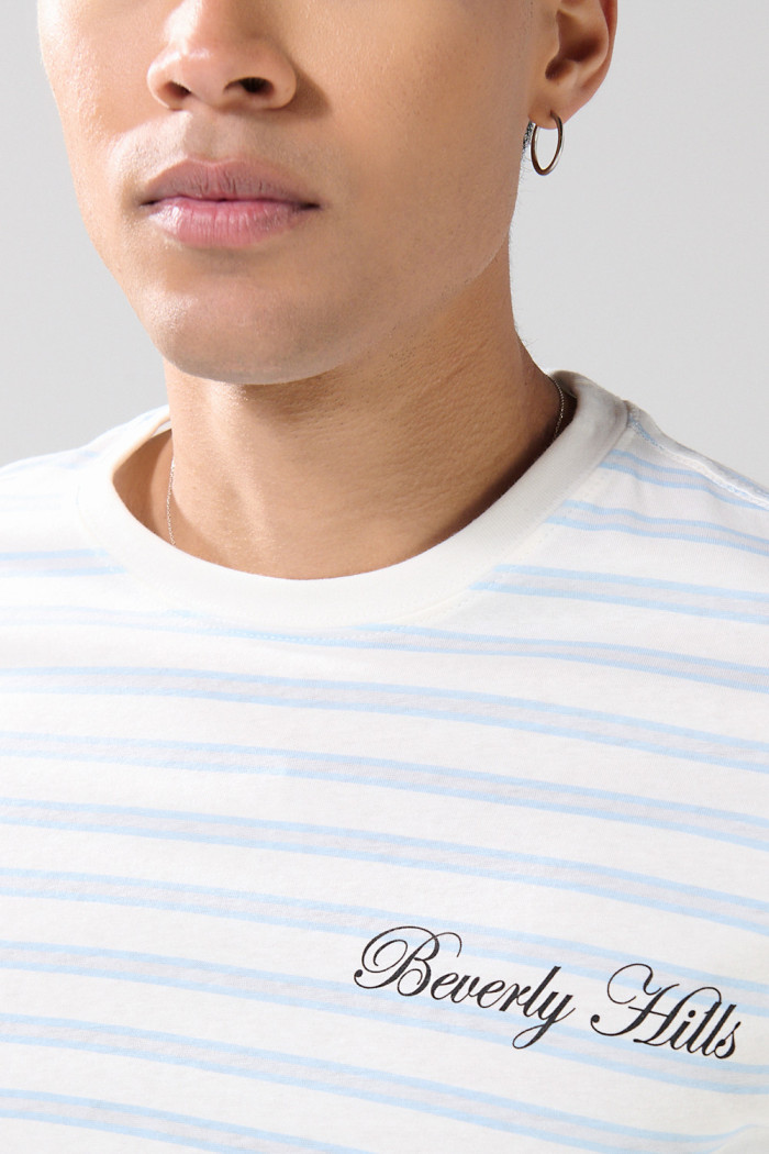 Camiseta manga corta crema a rayas con diseño college