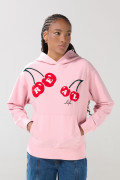 Buzo oversize rosado con capota y diseño de cerezas