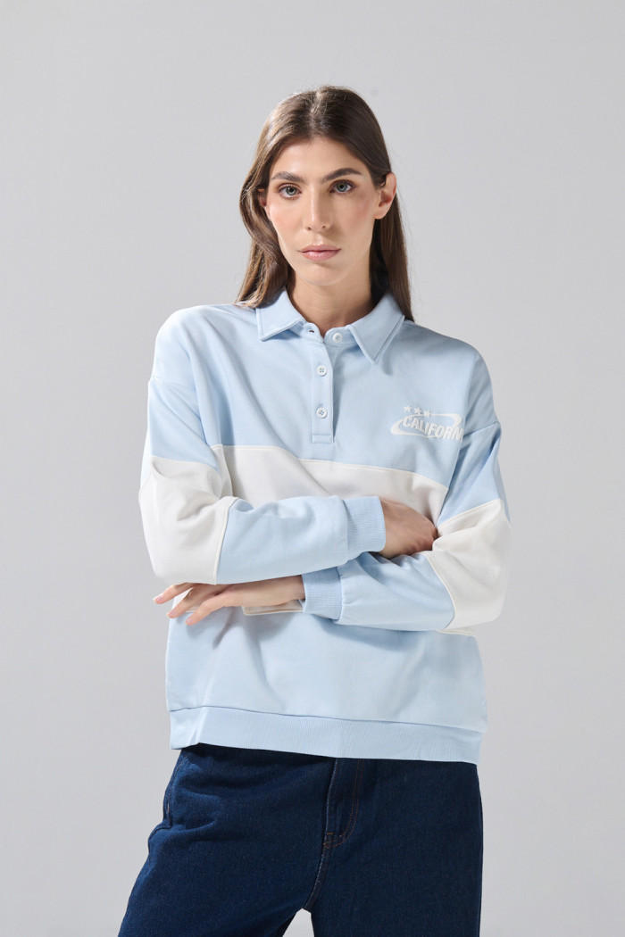 Buzo cuello sport azul claro college oversize