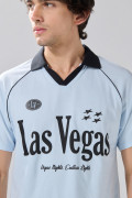 Camiseta manga ranglan oversize azul college con cuello polo