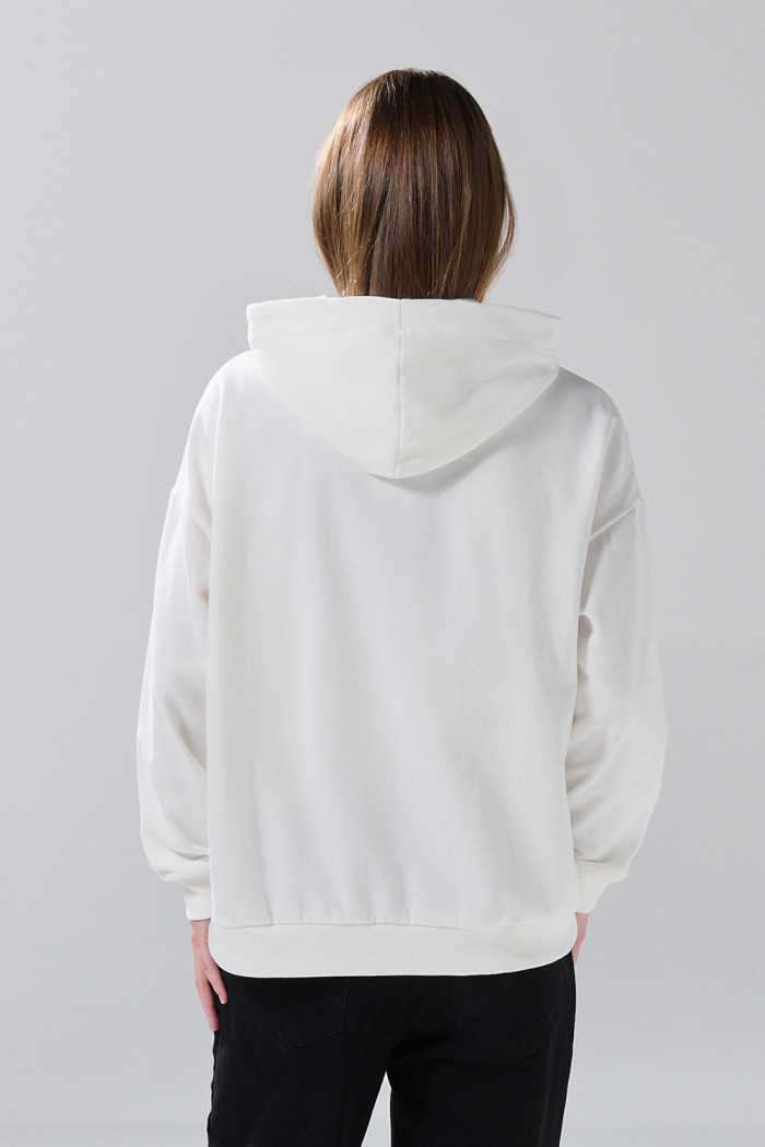 Buzo con capota crema claro oversize y arte college