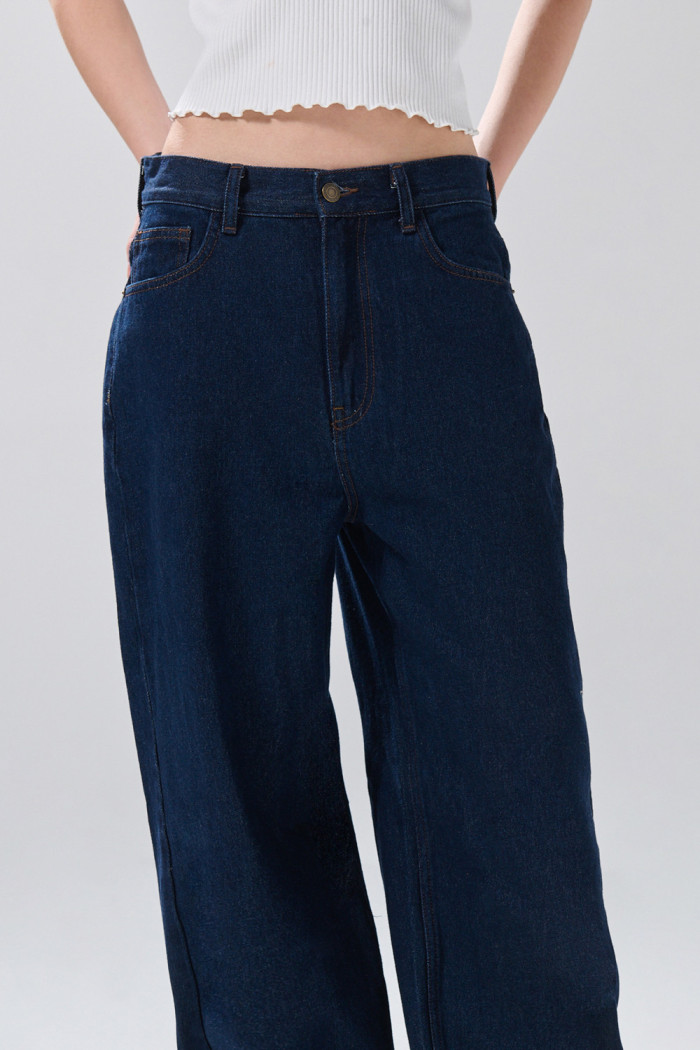 Jean baggy tiro medio azul intenso con bota ancha