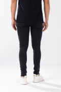 Jean gris intenso skinny con bolsillos y tiro bajo

