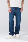 Jean tiro medio baggy infaltables azul oscuro con bota ancha
