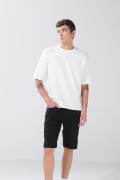 Bermuda slim de jean negra infaltables con tiro bajo
