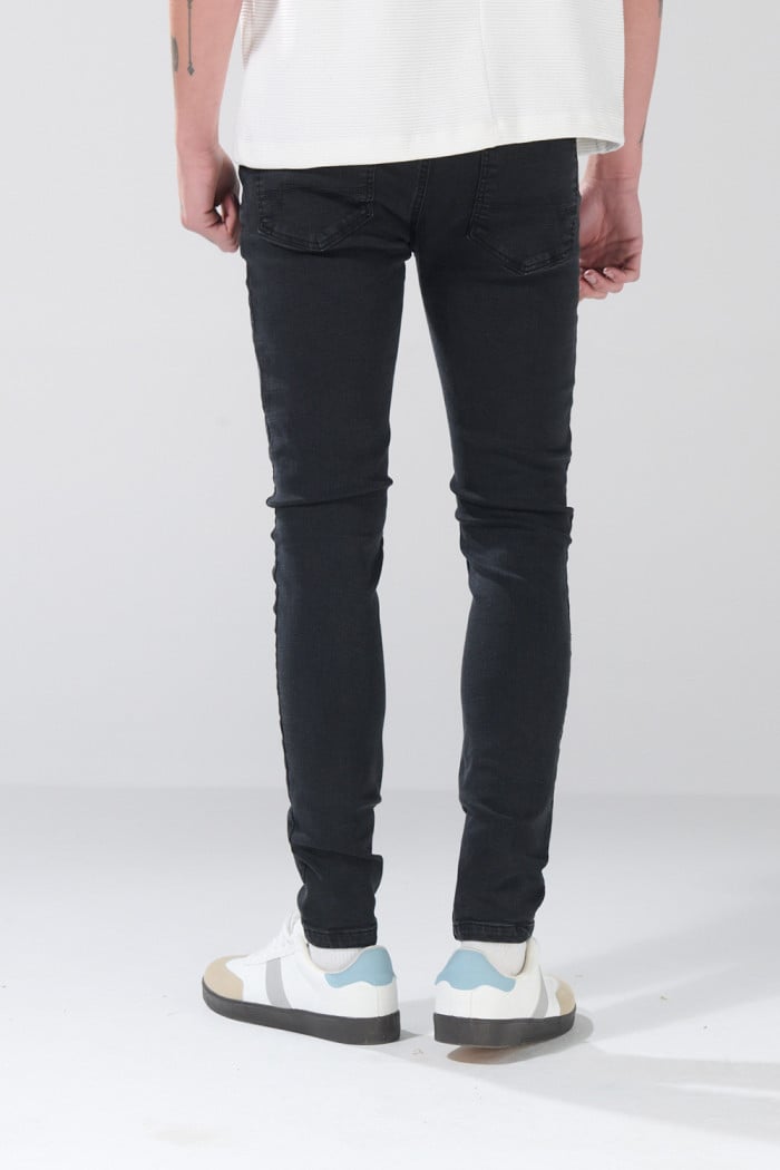 Jean infaltables tiro bajo skinny gris intenso con cremallera

