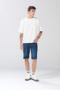 Bermuda tiro bajo slim azul de jean infaltables con botón
