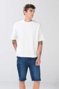 Bermuda tiro bajo slim azul de jean infaltables con botón
