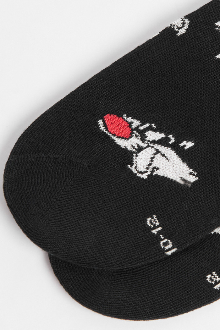 Medias tobilleras negras con diseños de Looney Tunes
