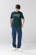 Camiseta en algodón verde con arte college y cuello redondo