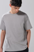 Camiseta en algodón hombro rodado unicolor con manga corta