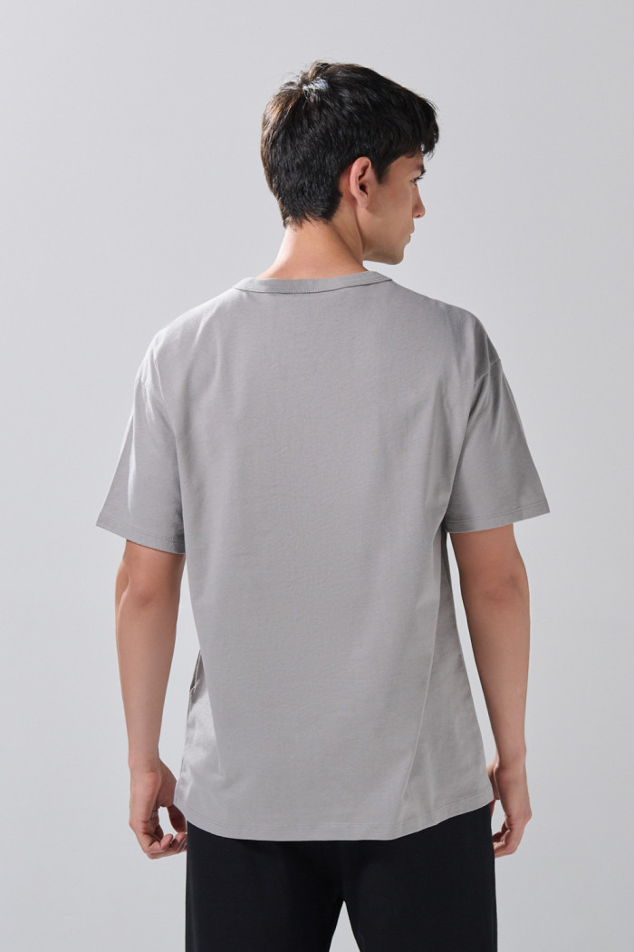 Camiseta en algodón hombro rodado unicolor con manga corta
