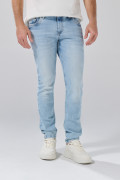 Jean skinny con 5 bolsillos azul claro, desgastes y tiro bajo