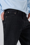 Jean gris baggy infaltables con tiro medio y bota ancha
