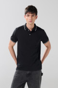 Camiseta polo infaltables manga corta unicolor con botones
